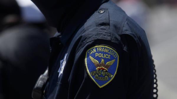 A veteran SFPD police officer was arrested and is facing charges in a fraud scheme that resulted in tens of thousands in payouts, officials said.
